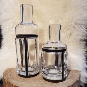 Two glass bottle vases